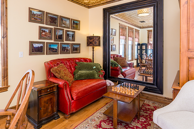 Mirror and chair in sitting area